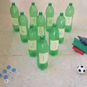 Plastic water bottles turned into numbered bowling pins